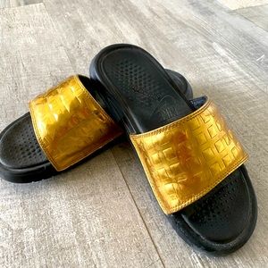 Nike gold slides